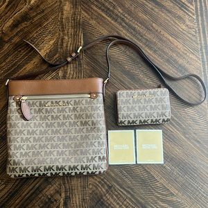 Michael Kors monogrammed cross bag with matching wallet